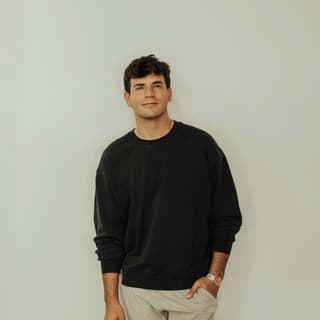 Nik E.